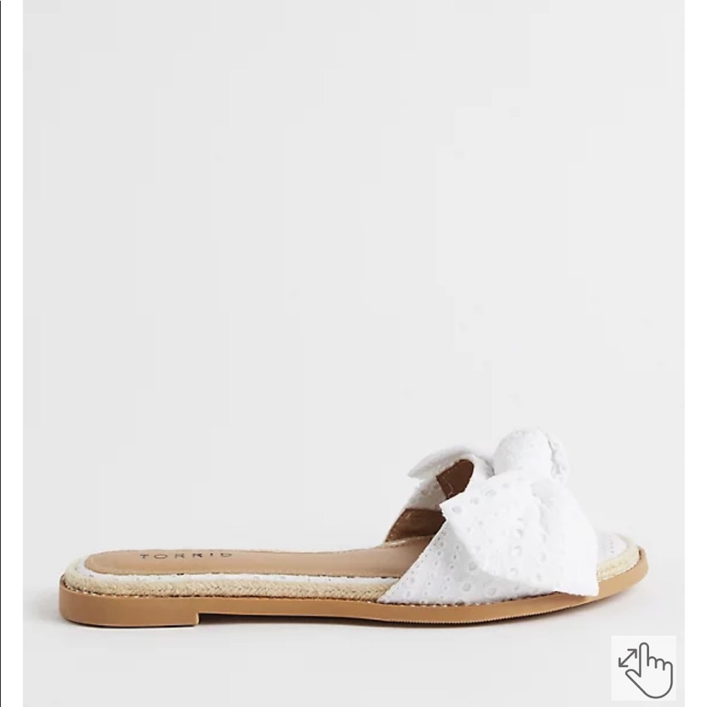 Torrid white eyelet bow slide sandals.
